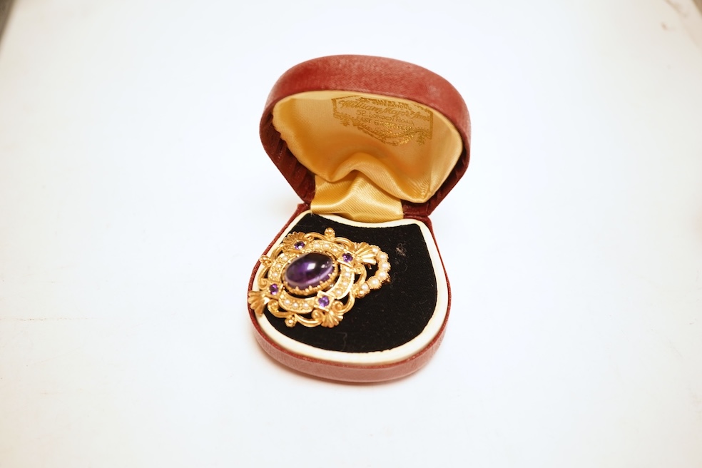 A cabochon amethyst and half pearl brooch, mounted in 9ct gold, length 3.7cm, British hallmarks, gross weight approximately 9.5 grams; and a 9ct half pearl wreath brooch, length 2.1cm, British hallmarks, gross weight 2 g